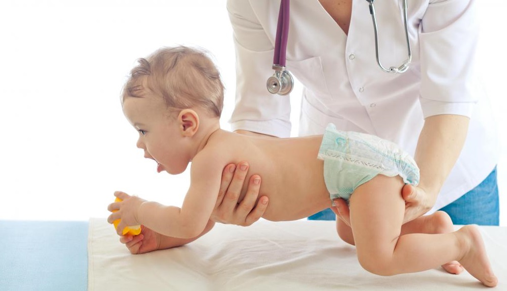 pediatrician-examining-hyper-baby.jpg